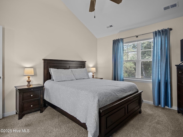 bedroom with light carpet, baseboards, visible vents, and vaulted ceiling