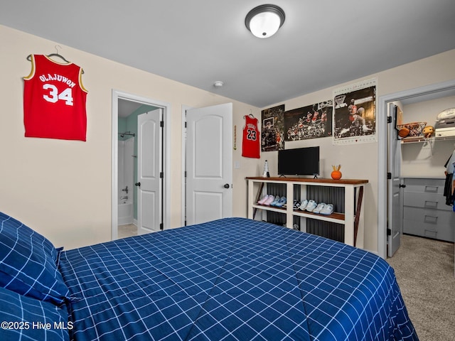 bedroom featuring a spacious closet and carpet