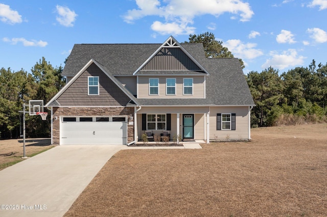 craftsman-style house featuring an attached garage, driveway, stone siding, roof with shingles, and a front lawn