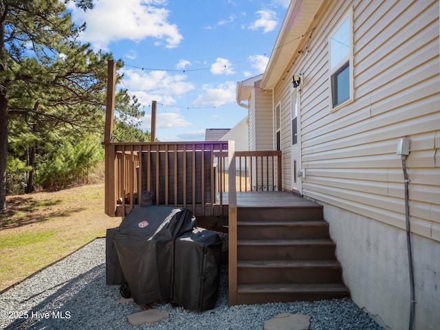 wooden deck featuring grilling area