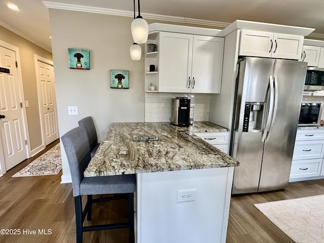 kitchen with a peninsula, dark wood-style flooring, white cabinets, appliances with stainless steel finishes, and open shelves