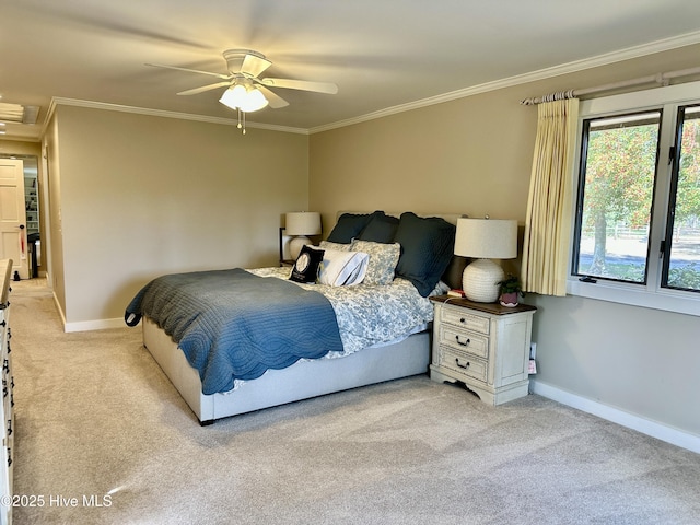 bedroom with ornamental molding, light carpet, ceiling fan, and baseboards