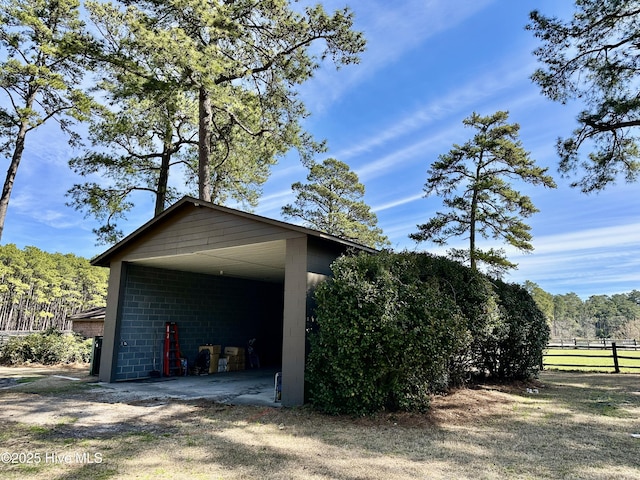 garage featuring fence