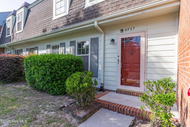 4937 Marlin Ct, Wilmington, NC 28403 - view of exterior entry featuring roof with shingles