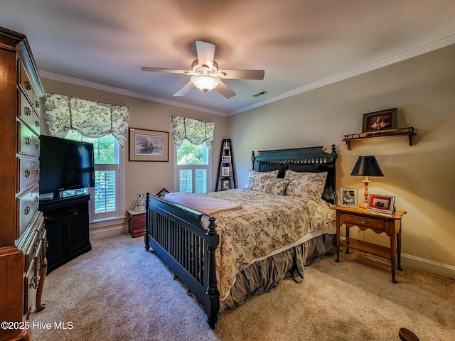 bedroom featuring carpet flooring, visible vents, and crown molding