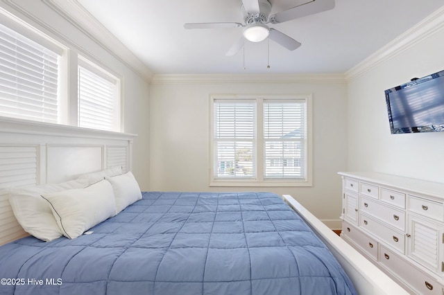 bedroom featuring ornamental molding and a ceiling fan