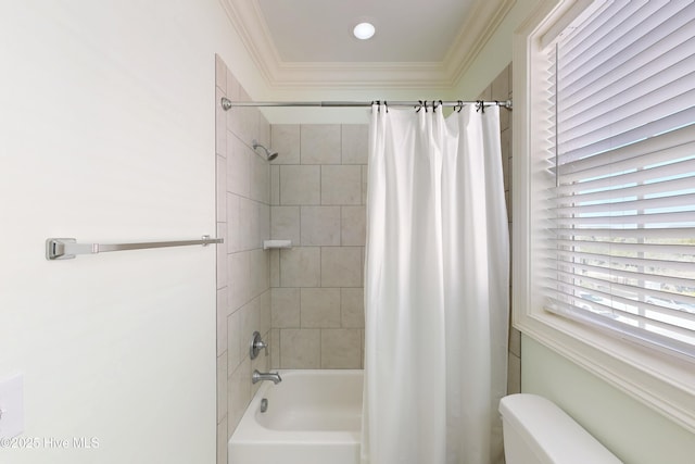 full bath featuring shower / bath combo, toilet, and crown molding