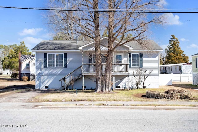 view of front of property with stairway