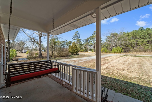 view of patio featuring a porch