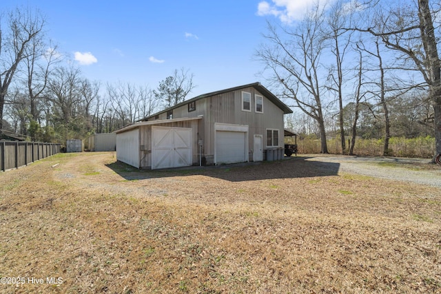 detached garage with fence