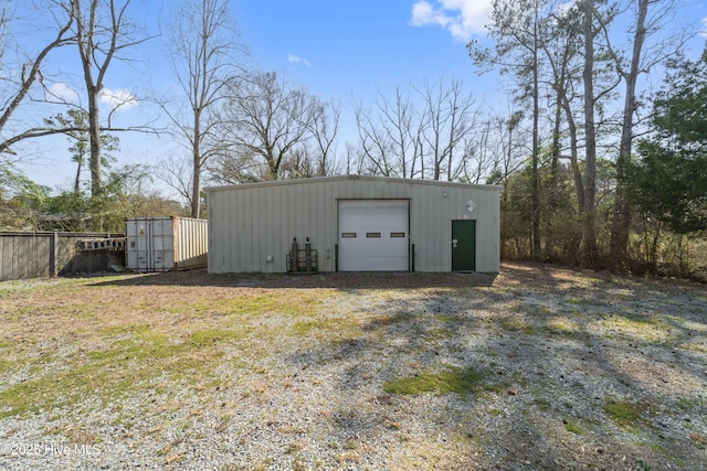 detached garage with fence