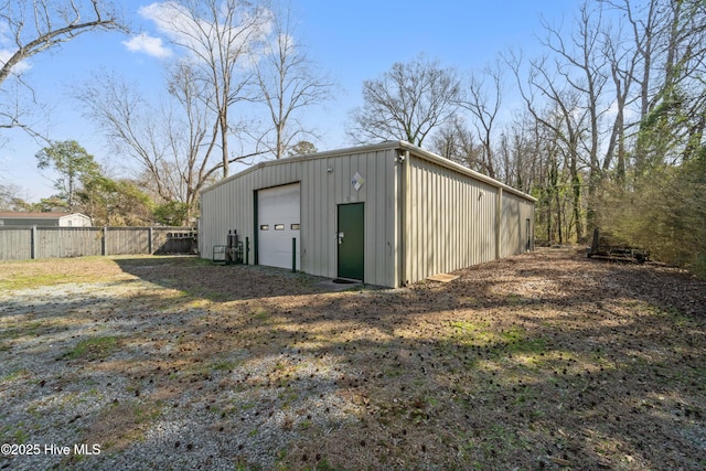 view of outdoor structure with an outdoor structure and fence