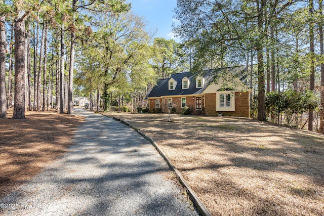 view of front of home with brick siding