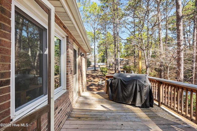 wooden terrace with grilling area