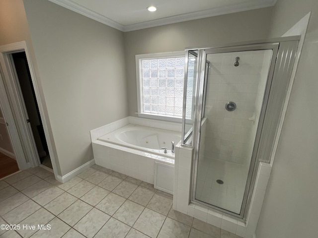 bathroom featuring ornamental molding, a shower stall, a whirlpool tub, and tile patterned floors