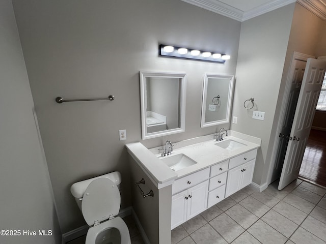 full bath featuring double vanity, ornamental molding, a sink, and tile patterned floors