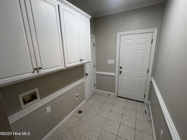 interior space featuring light tile patterned floors, ornamental molding, visible vents, and baseboards