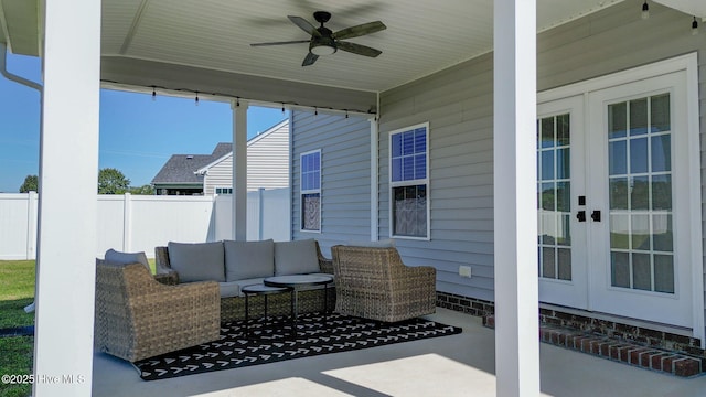 view of patio / terrace with french doors, outdoor lounge area, a ceiling fan, and fence