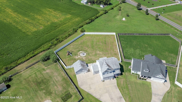 birds eye view of property featuring a rural view