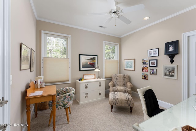 carpeted office with baseboards, ornamental molding, visible vents, and a healthy amount of sunlight