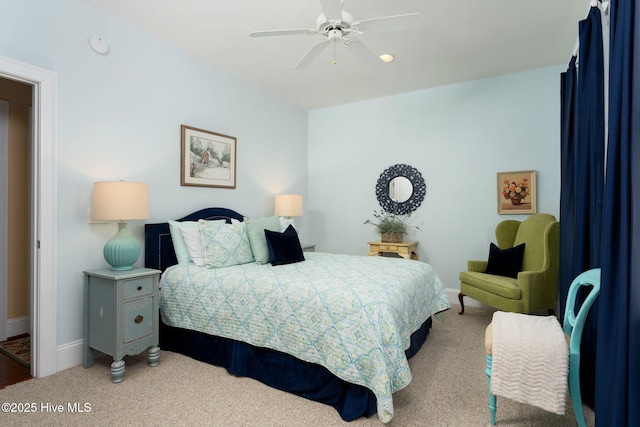 bedroom featuring carpet, a ceiling fan, and baseboards