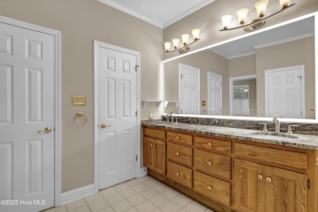 full bath featuring ornamental molding, double vanity, a sink, and tile patterned floors