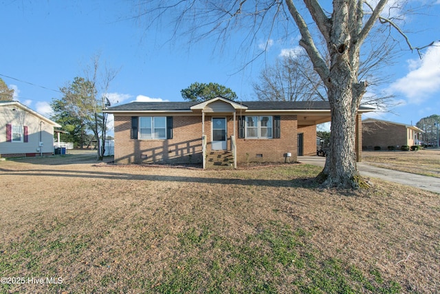 single story home with brick siding, driveway, crawl space, a carport, and a front yard