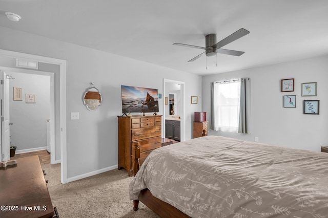 carpeted bedroom featuring baseboards and ceiling fan