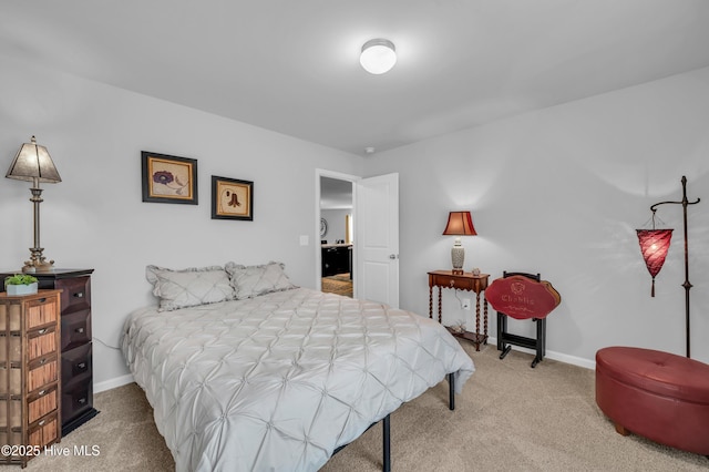 carpeted bedroom with baseboards