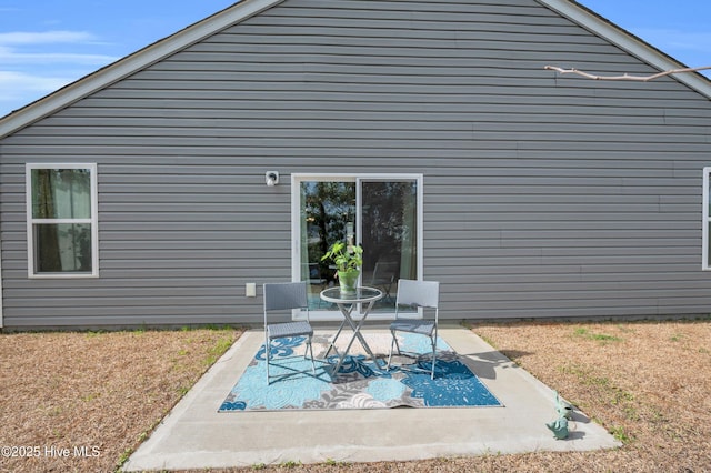 back of house with a patio area