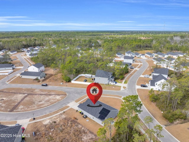 aerial view with a wooded view