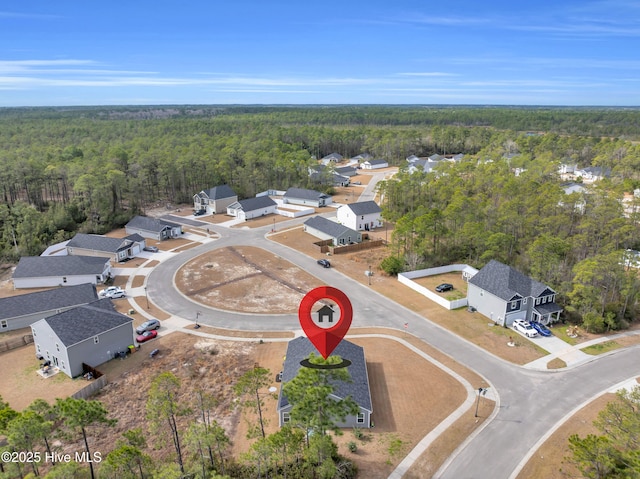 aerial view featuring a forest view