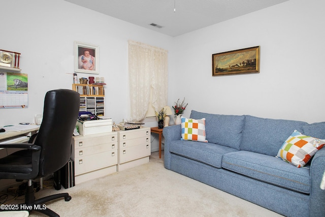 office area featuring carpet and visible vents