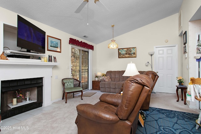 living room with a fireplace with flush hearth, carpet, lofted ceiling, and a textured ceiling