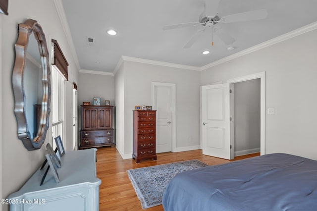 bedroom with crown molding, recessed lighting, visible vents, light wood-style flooring, and baseboards