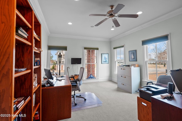 carpeted home office featuring ceiling fan, recessed lighting, baseboards, and crown molding