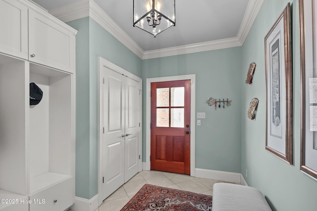 mudroom with ornamental molding, a notable chandelier, baseboards, and light tile patterned floors