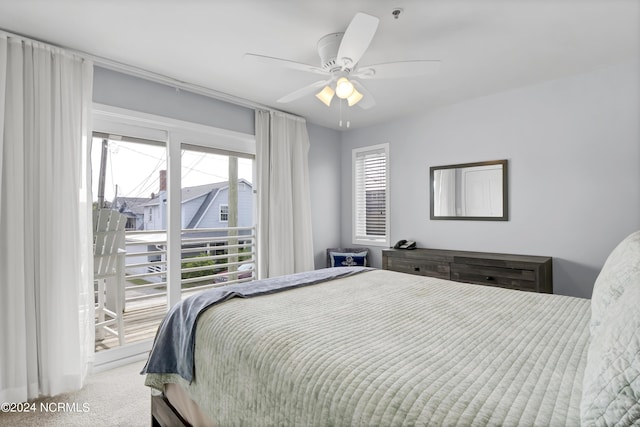 bedroom featuring multiple windows, carpet floors, and ceiling fan