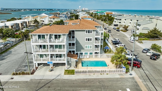 aerial view featuring a residential view and a water view