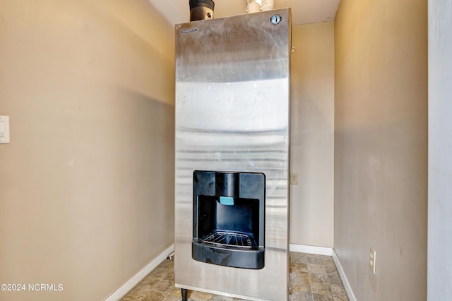 interior details featuring baseboards and a fireplace