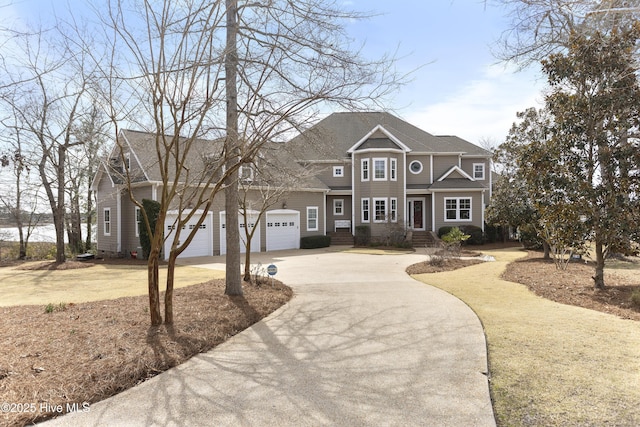 view of front of property featuring crawl space, an attached garage, and concrete driveway