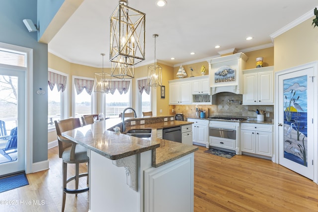 kitchen with light wood-type flooring, decorative backsplash, dishwashing machine, white cabinetry, and a warming drawer