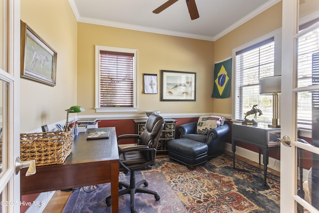 office featuring a ceiling fan, crown molding, french doors, and a wealth of natural light