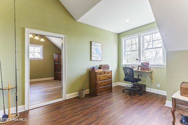 office area with vaulted ceiling and dark wood-style floors