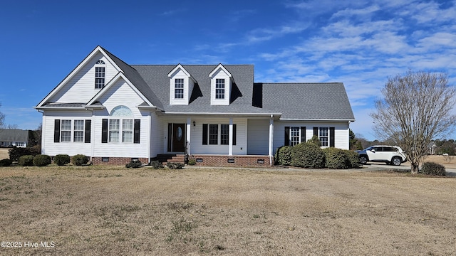 view of front facade with crawl space, a porch, and roof with shingles