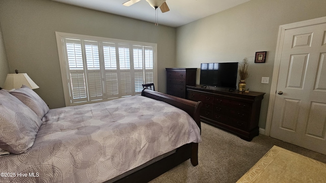 bedroom featuring ceiling fan and carpet flooring