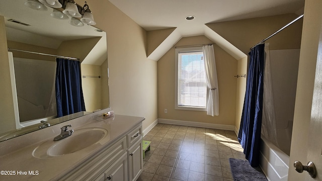 full bath featuring lofted ceiling, visible vents, vanity, tile patterned flooring, and baseboards