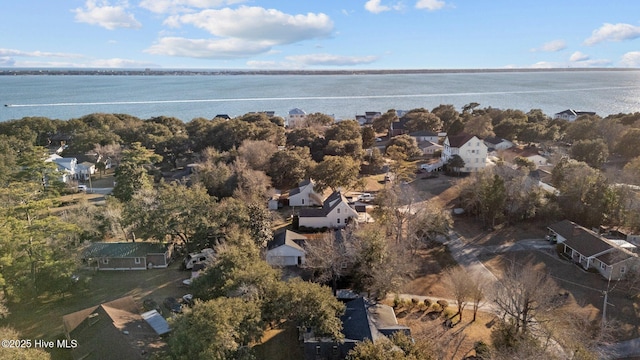 drone / aerial view featuring a water view and a residential view