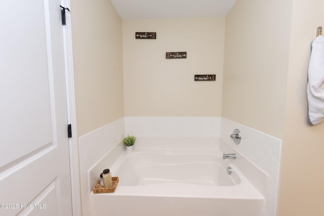 full bathroom with a garden tub