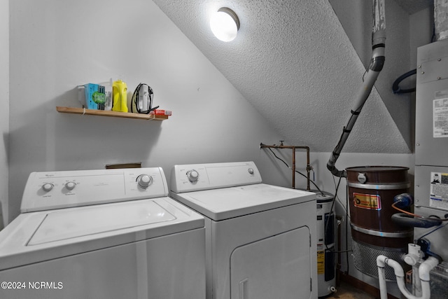 clothes washing area with laundry area and independent washer and dryer